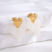 תמונה של עגיל סטיינלס סטיל מוזהב לב ומתחתיו לב לבן (זוג)