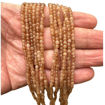 תמונה של ג'ייד חום עגול פסט 3-3.2 מ"מ